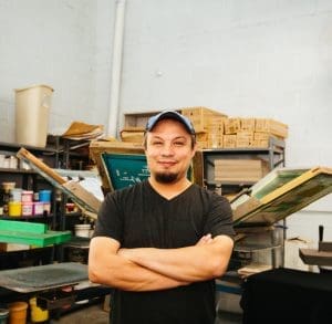 Photo of owner of Ideas Marketing in store