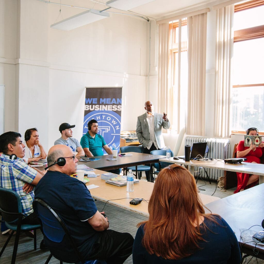 group of people gathered in a meeting room