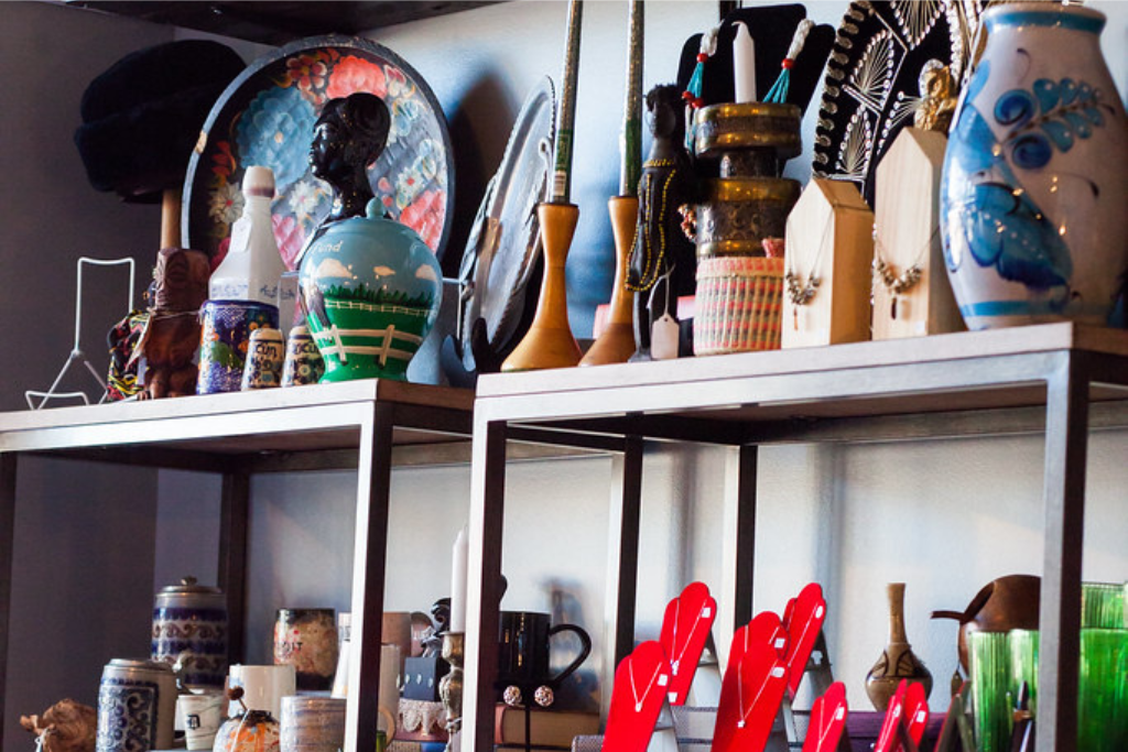 A selection of home decor and furnishing on shelving displays in a store